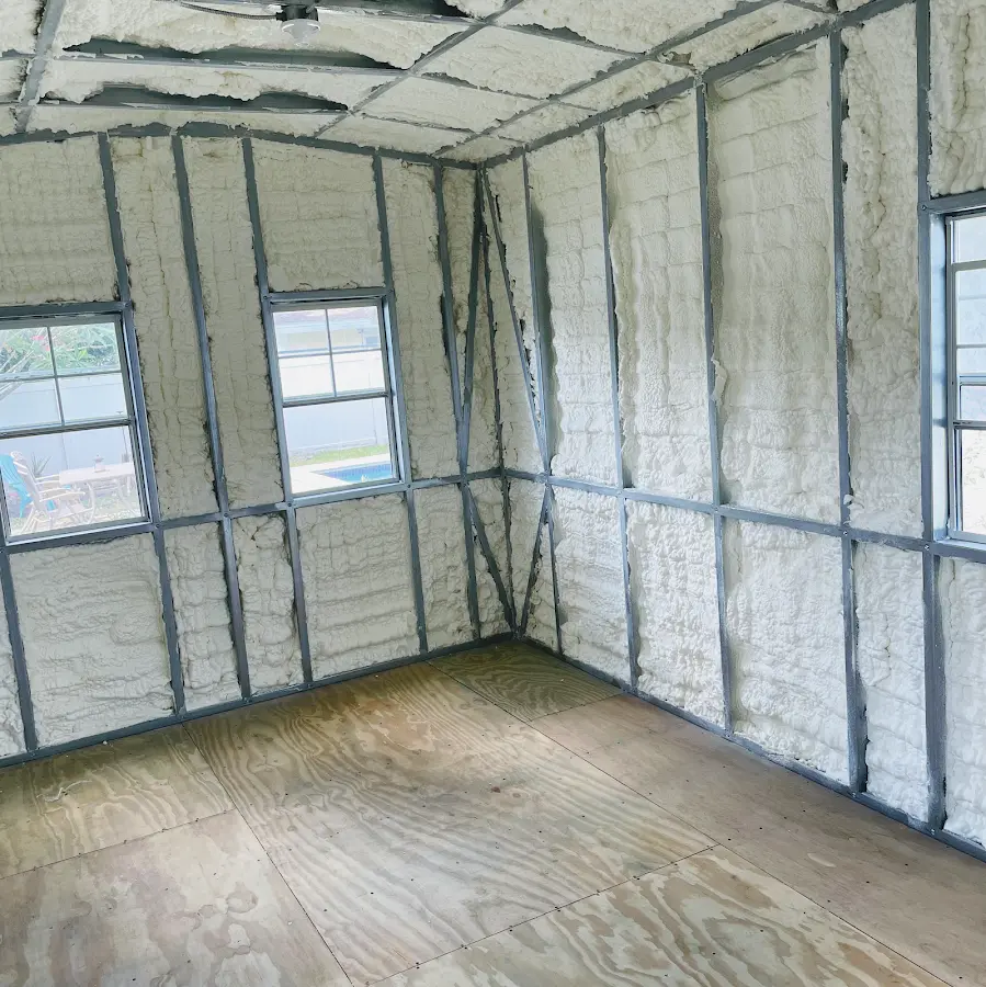 Closed-cell spray foam insulation applied to wall cavities in a residential project in Ithaca